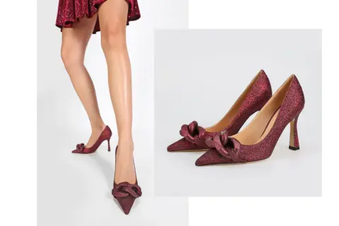 Błyszczące, czerwone szpilki z kokardką to idealne buty do satynowej sukienki na specjalne okazje.