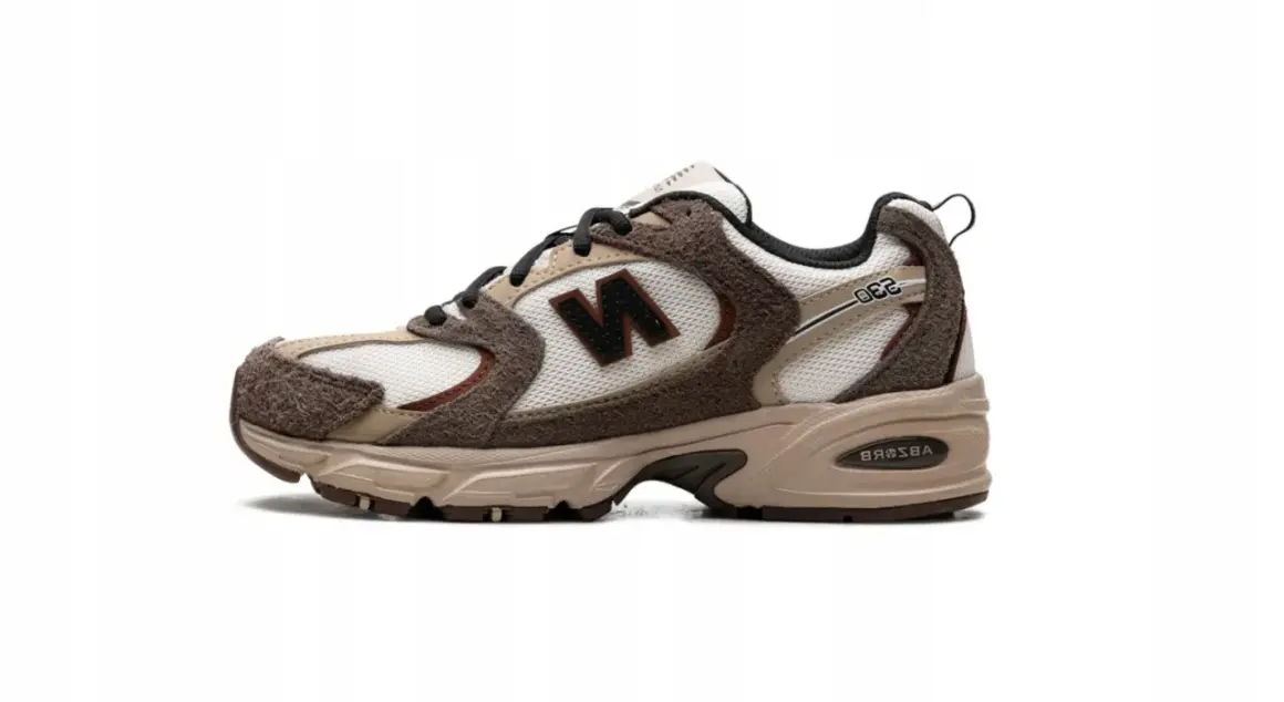 Buty sportowe New Balance 530 w odcieniach brązu, idealne na codzienne spacery.