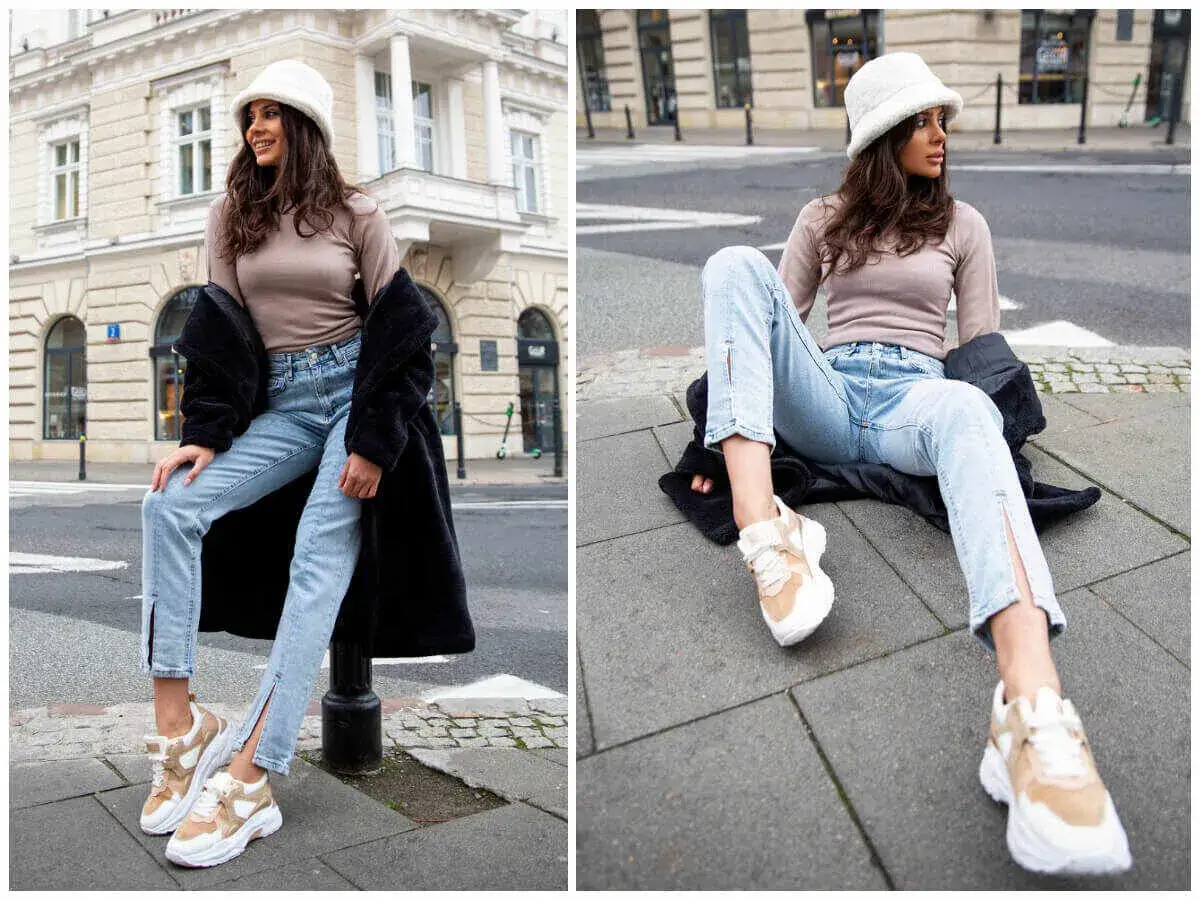 Modna kobieta w jeansach z rozcięciami i sneakersach. Oto inspiracja, czym nosić boyfriendy stylizacje na co dzień.
